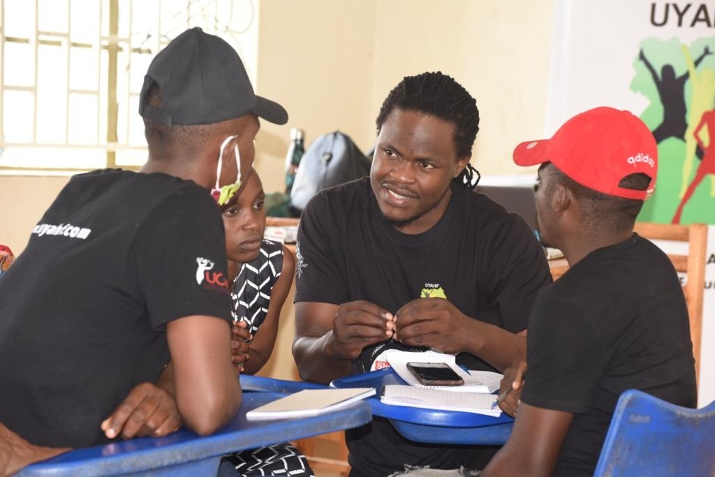 Valentino Richard Kabenge Facilitates Training of MDD items in Kyegegwa District With UYAHF 